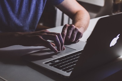 man working at laptop